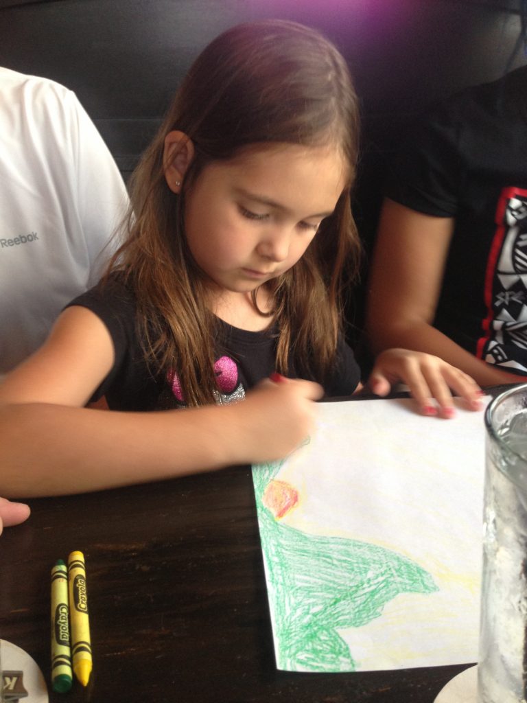 Holly Wilson-SWAIA 2013-Zoe drawing at dinner